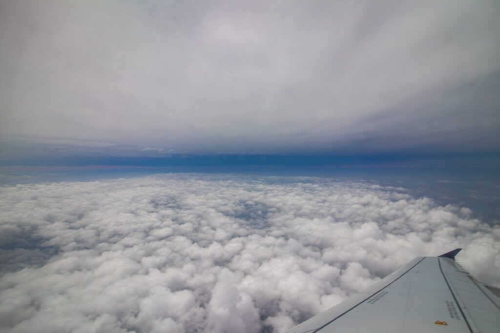 The shadow of the moon, during a solar eclipse, approaching. Taken from the awindow of an airplane.
